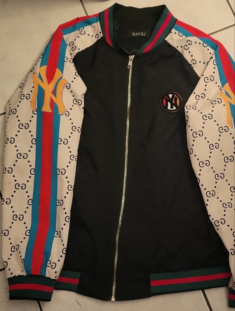 Gucci Black Bomber Jacket with Cream Monogram Sleeves and Red & Blue Stripes